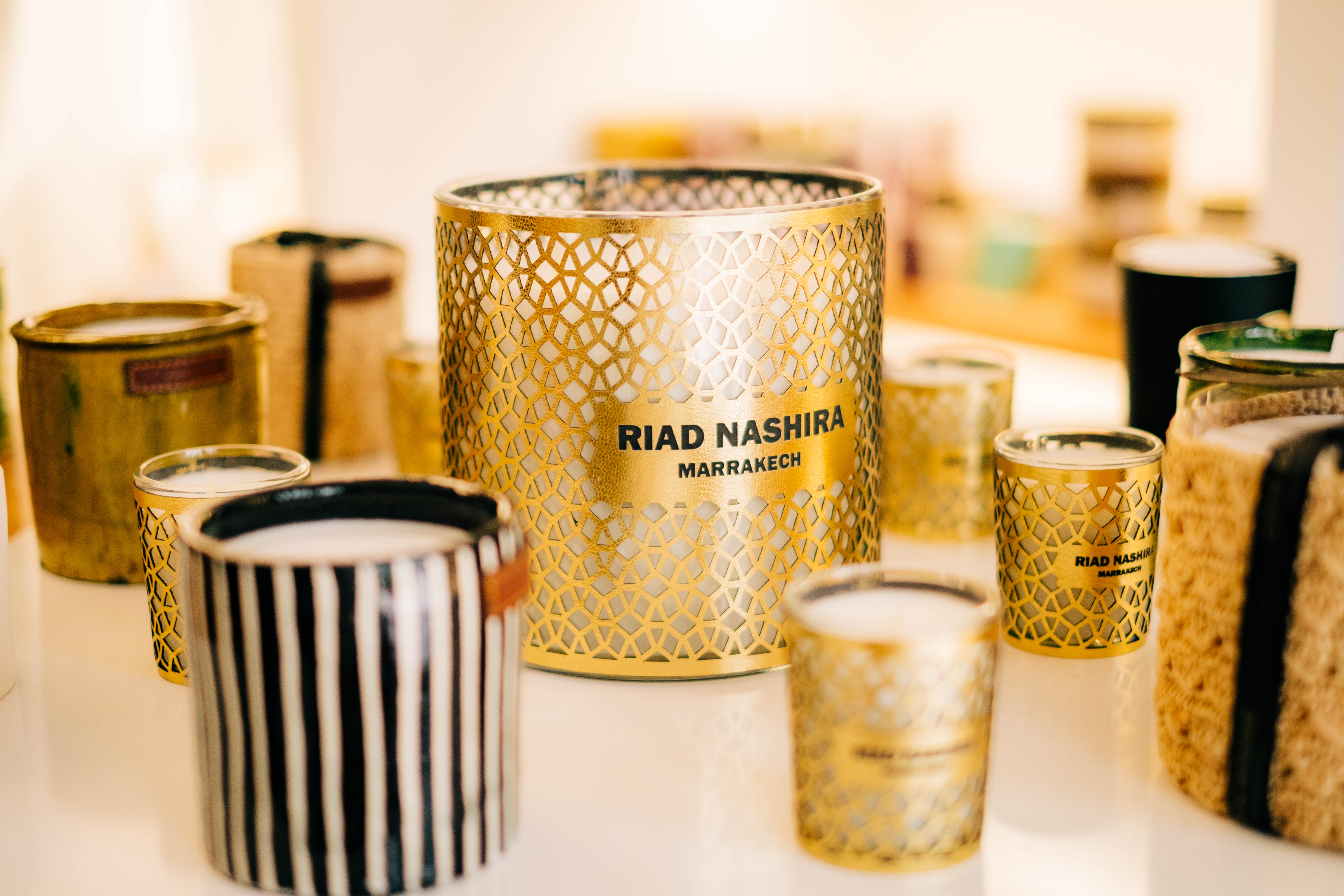 luxury Moroccan boutique, traditional crafts display, elegant shopping interior, artisan products showcase