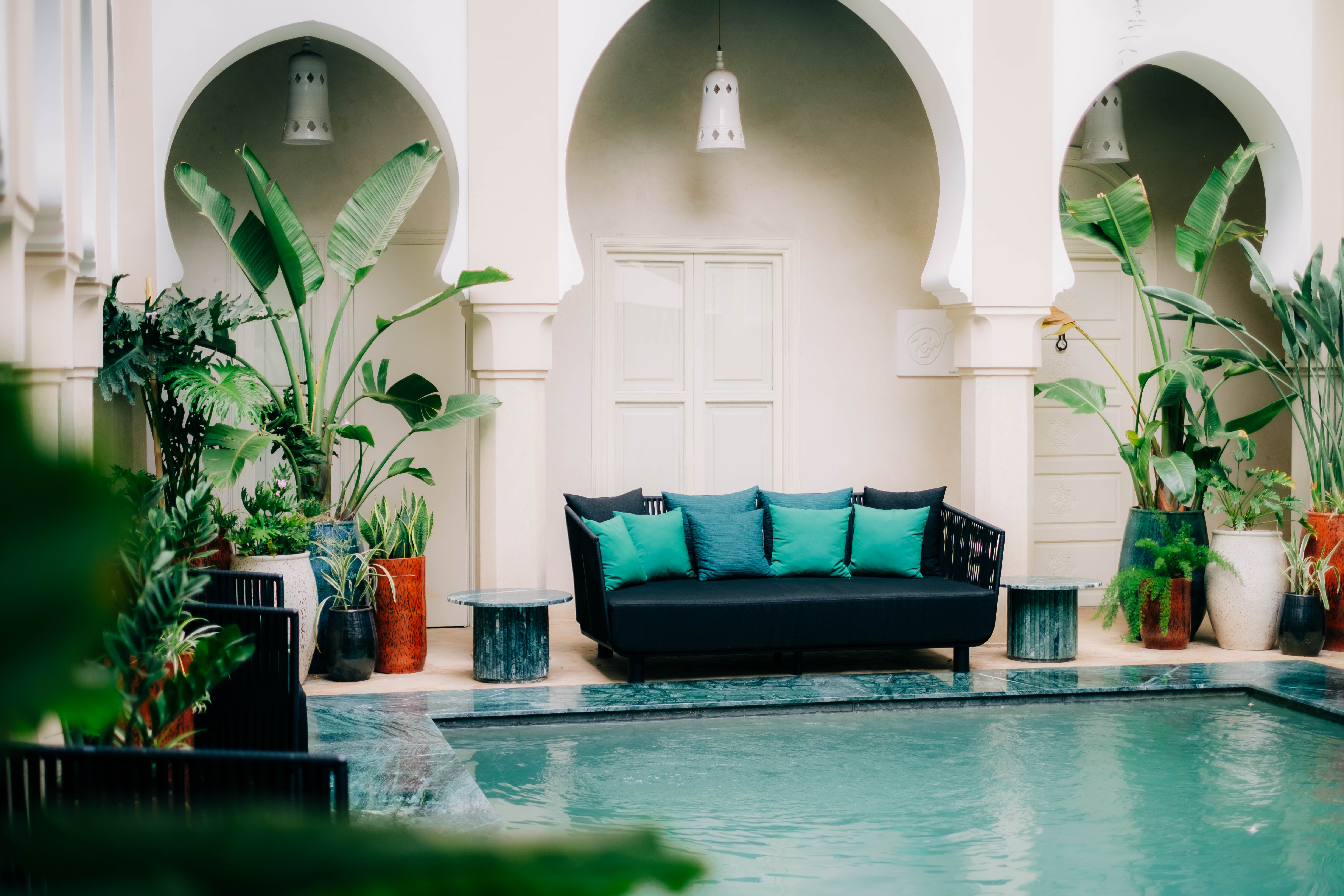 stunning rooftop infinity pool at a luxury Moroccan riad