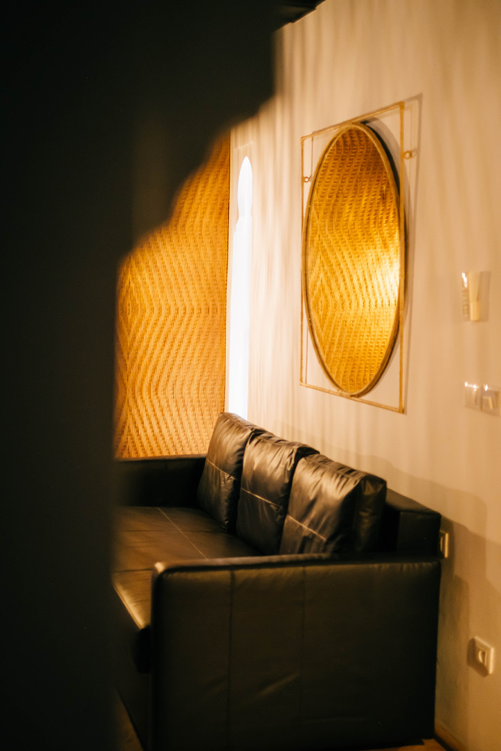 Intimate seating area in Moroccan comfort room with traditional cushions, low table, warm ambiance, authentic decor